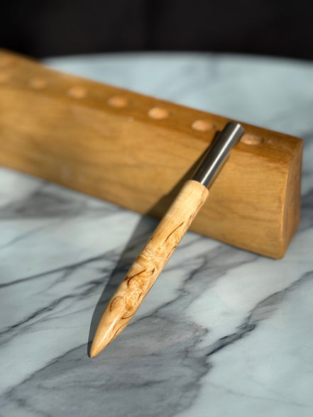 Gedrechselter Flaschenöffner aus Maserbirke